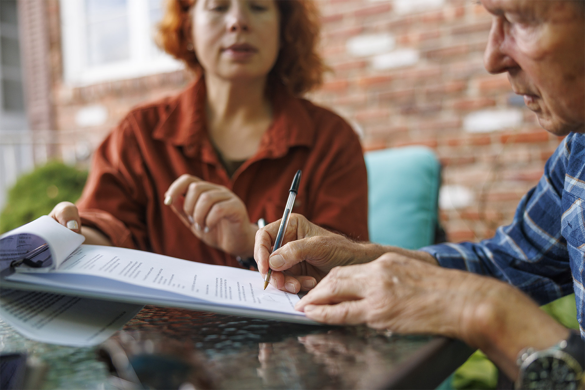 Signing documents during a financial consultation